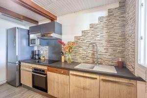 Η κουζίνα ή μικρή κουζίνα στο App 3 chambres en Duplex - Bord de plage