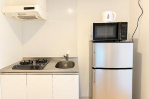 Η κουζίνα ή μικρή κουζίνα στο Grateful Chikushino 201 - Vacation STAY 20487 +10 φωτογραφίες