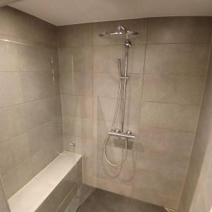 a bathroom with a shower with a glass door at Eksklusiv stort boende i Fredrikshavn in Frederikshavn +12 photos