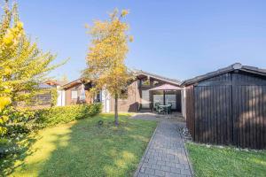 Κήπος έξω από το Ferienwohnpark Immenstaad am Bodensee Satteldachhaus Typ 9 SD 17