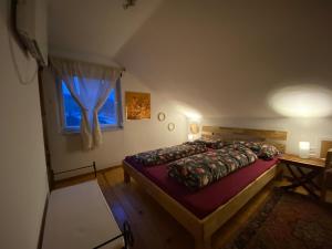 Postel nebo postele na pokoji v ubytování Burgblick Stube