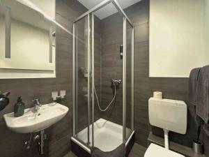 Koupelna v ubytování HAVENU Hotel Quartier 8 + 57 fotografií