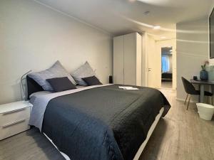 Postel nebo postele na pokoji v ubytování HAVENU Hotel Quartier 8