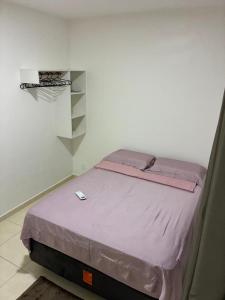 Una cama o camas en una habitación de Condomínio Smart Torquato 1