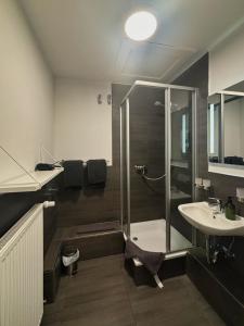 Koupelna v ubytování HAVENU Hotel Quartier 8