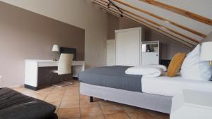 Χώρος καθιστικού στο Stay Smart Giessen Hotel und Appartments