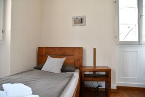 Postel nebo postele na pokoji v ubytování Gästehaus stuttgART36