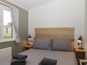 Ένα ή περισσότερα κρεβάτια σε δωμάτιο στο 6 Manor Park - 3 Bedroom - Sea views nearby