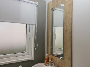 Ένα μπάνιο στο 6 Manor Park - 3 Bedroom - Sea views nearby +14 φωτογραφίες