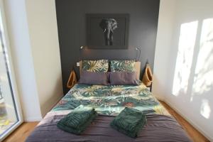 En eller flere senge i et værelse på Appartement 43m2 1 chambre en hyper centre