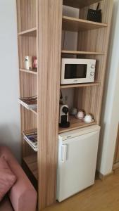 Η κουζίνα ή μικρή κουζίνα στο Студио 8 Уютна Почивка +5 φωτογραφίες