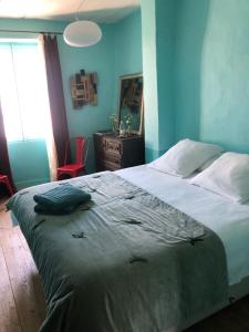 Una cama o camas en una habitación de Calone 17 Ile de Ré