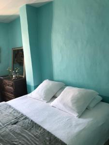 Una cama o camas en una habitación de Calone 17 Ile de Ré