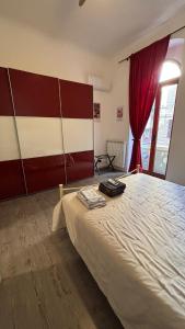 En eller flere senge i et værelse på Apartment Liberty