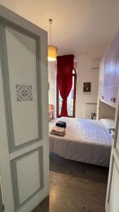 En eller flere senge i et værelse på Apartment Liberty