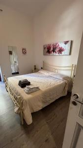 En eller flere senge i et værelse på Apartment Liberty