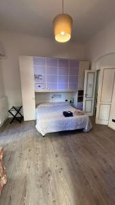 En eller flere senge i et værelse på Apartment Liberty