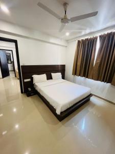 Postel nebo postele na pokoji v ubytování Coastal Nest Home - Malpe Beach