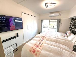 Postel nebo postele na pokoji v ubytování K2 square 605