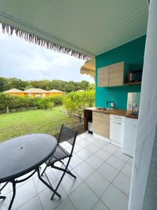 Køkken eller tekøkken på La Plume Kawannaise - - Accès plage à pieds