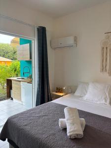 En eller flere senge i et værelse på La Plume Kawannaise - - Accès plage à pieds