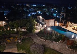 Πισίνα στο ή κοντά στο La Claudina - Cabañas Boutique en las Sierras