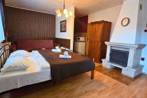 Ένα ή περισσότερα κρεβάτια σε δωμάτιο στο Spa & Pool Apartments Prestige VILLA IVICA