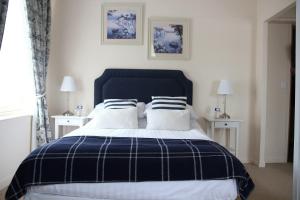 Ένα ή περισσότερα κρεβάτια σε δωμάτιο στο Hotel Restaurant Le Lion Verd