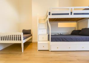a bedroom with a bunk bed and a bunk bedweredweredwered at Kop View in Liverpool