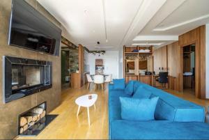 Un televizor și/sau centru de divertisment la Luxury Apartments & Villas