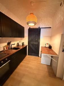 Køkken eller tekøkken på Cosy Apartment im Weddinger Herz