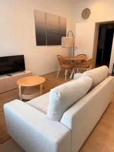 Et tv og/eller underholdning på Cosy Apartment im Weddinger Herz + 3 billeder