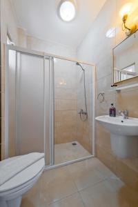 Ванная комната в YENI DOGA HOTEL