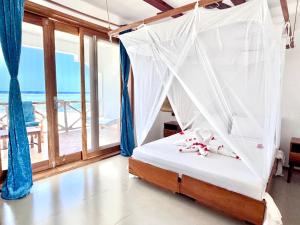 Ένα ή περισσότερα κρεβάτια σε δωμάτιο στο Just Heaven Apartments