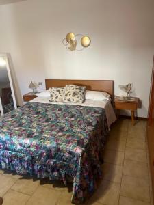 Postel nebo postele na pokoji v ubytování La casa di Anastasia