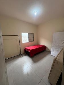 Ένα ή περισσότερα κρεβάτια σε δωμάτιο στο Casa São Vicente - 10 min from Praia Grande Ocean