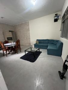 Χώρος καθιστικού στο Casa São Vicente - 10 min from Praia Grande Ocean