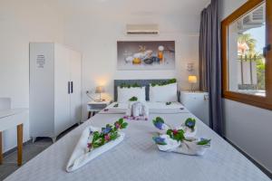 Кровать или кровати в номере YENI DOGA HOTEL +118 фотографий