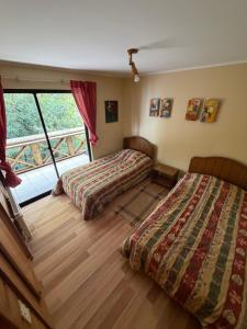 En eller flere senge i et værelse på Hermoso departamento con 2 baños en Suite