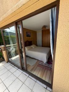 Ένα ή περισσότερα κρεβάτια σε δωμάτιο στο Cabañas Cucao