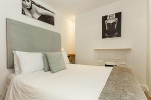 Ένα ή περισσότερα κρεβάτια σε δωμάτιο στο Brightonwave