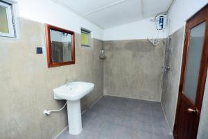 Koupelna v ubytování Elephant Trail Homestay