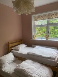 En eller flere senge i et værelse på Bright spacious apartment