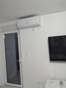 TV a/nebo společenská místnost v ubytování Mojito sleep + 2 fotografie