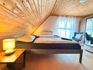 Una cama o camas en una habitación de Apartments Rupnik