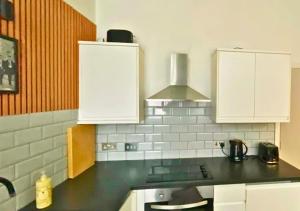 Køkken eller tekøkken på The Halifax Suites - sleeps 3