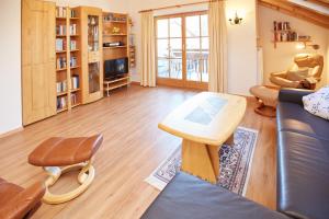 Гостиная зона в Ferienwohnung F. Füglein