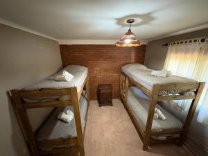 Postel nebo postele na pokoji v ubytování Cabañas 4 Cascadas