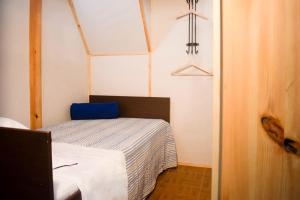 Ένα ή περισσότερα κρεβάτια σε δωμάτιο στο A Oficina do Costa