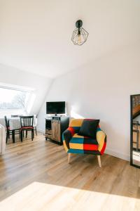 TV a/nebo společenská místnost v ubytování Confort et modernité au cœur de l'Aubrac